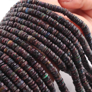 1 Long Strand Black Ethiopian Welo Opal Faceted Heishi Briolettes - Wheel Beads - 4mm-10mm - 16 Inches BR01300 - Tucson Beads