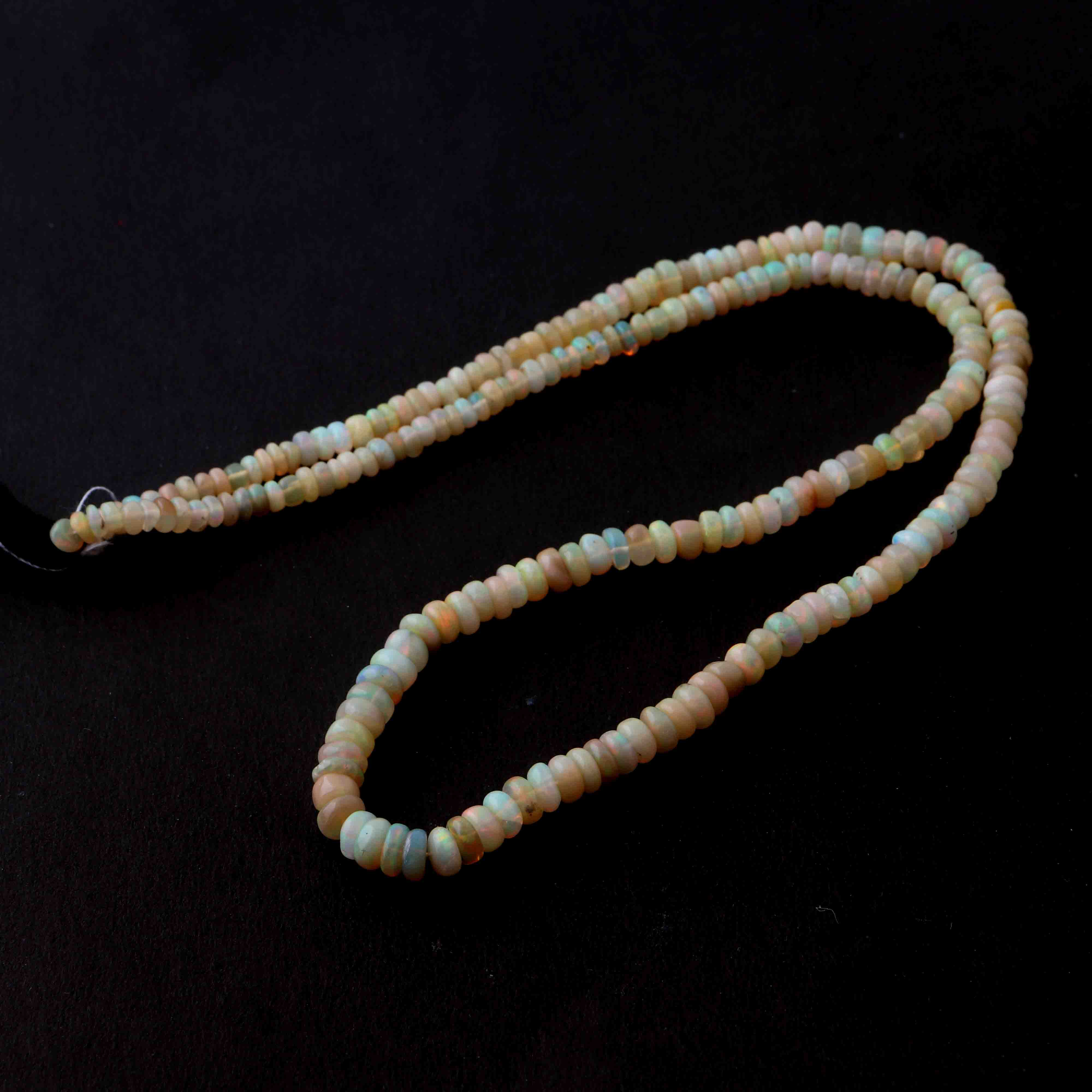 Ethiopian Opal Faceted Roundel Beads 5-8mm size, 16 Inch Strand